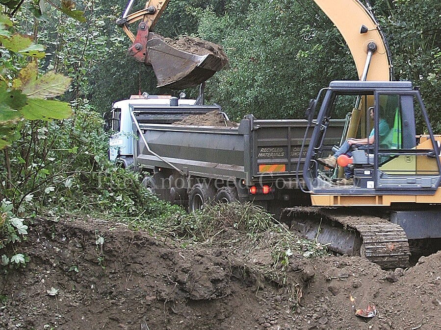 Removing excavation spoil
